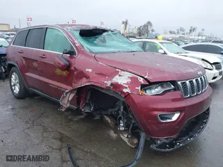 2021 Jeep Grand Cherokee Laredo X with VIN 1C4RJEAG4MC681989, listed as a IAAI auction lot 41571341 with 61,090 mi miles. Bid and sale history available at carsss.com. Image 1.