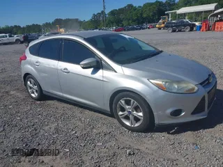 2013 Ford Focus SE with VIN 1FADP3K26DL325338, listed as a IAAI auction lot 42051716 with 115,770 mi miles. Bid and sale history available at carsss.com. Image 1.