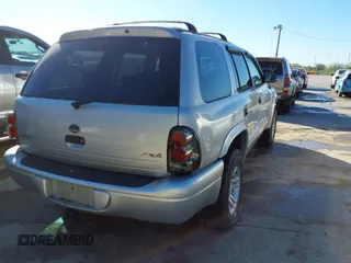 2001 Dodge Durango z VIN 1B4HS28N11F619257, wystawiony jako IAAI lot #41834255 z przebiegiem 180 080 mil mil oraz . Historia ofert i sprzedaży dostępna na DreamBid. Obrazek 4.
