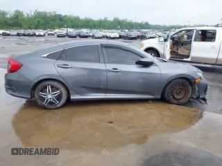 2019 Honda Civic Sedan LX with VIN 2HGFC2F60KH537797, listed as a IAAI auction lot 42119603 with 1 mi miles. Bid and sale history available at carsss.com. Image 12.