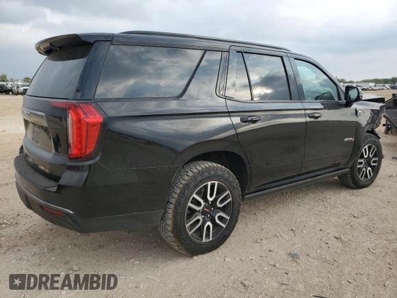2021 GMC Yukon AT4 with VIN 1GKS2CKDXMR417491, listed as a Copart auction lot 79265374 with 74,073 mi miles and Salvage Title. Bid and sale history available at carsss.com. Image 3.