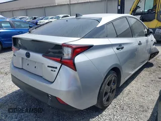 2022 Toyota Prius L Eco with VIN JTDKAMFU8N3164240, listed as a IAAI auction lot 41892462 with 35,980 mi miles and . Bid and sale history available at DreamBid. Image 4.