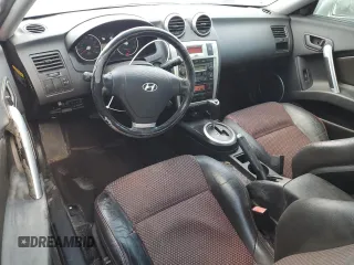 2006 Hyundai Tiburon GT z VIN KMHHN65F06U203701, wystawiony jako Copart lot #52374135 z przebiegiem 90 796 mil mil oraz Szkody całkowita. Historia ofert i sprzedaży dostępna na DreamBid. Obrazek 8.