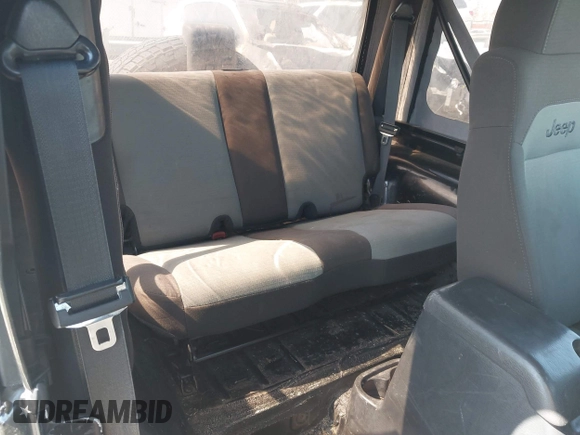 2005 Jeep Wrangler X with VIN 1J4FA39S35P372731, listed as a IAAI auction lot 41875121 with 146,034 mi miles and . Bid and sale history available at DreamBid. Image 8.