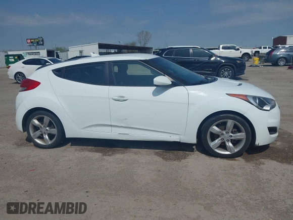 2014 Hyundai Veloster RE:FLEX z VIN KMHTC6AD5EU201168, wystawiony jako IAAI lot #41930766 z przebiegiem 198 909 mil mil oraz . Historia ofert i sprzedaży dostępna na DreamBid. Obrazek 6.