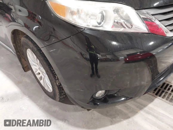 2012 Toyota Sienna XLE AAS with VIN 5TDYK3DC1CS234894, listed as a IAAI auction lot 41201751 with 108,464 mi miles and . Bid and sale history available at DreamBid. Image 6.