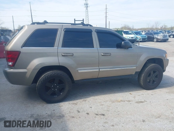 2005 Jeep Grand Cherokee Limited with VIN 1J4HR58N95C510465, listed as a IAAI auction lot 42027740 with 153,451 mi miles. Bid and sale history available at carsss.com. Image 13.