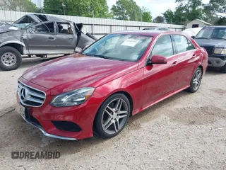 2014 Mercedes-Benz E-Class E 350 Sport with VIN WDDHF5KB7EA971128, listed as a IAAI auction lot 41942554 with 80,606 mi miles. Bid and sale history available at carsss.com. Image 2.