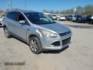 2013 Ford Escape SEL with VIN 1FMCU9H94DUA25017, listed as a IAAI auction lot 41976238 with 171,885 mi miles and . Bid and sale history available at carsss.com. Image 1.