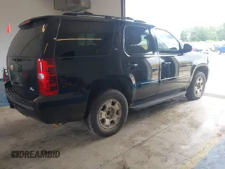 2007 Chevrolet Tahoe LT with VIN 1GNFC13037J129669, listed as a IAAI auction lot 42421808 with 268,523 mi miles and . Bid and sale history available at DreamBid. Image 4.