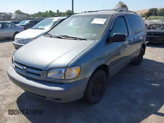 1999 Toyota Sienna LE with VIN 4T3ZF13C8XU109975, listed as a IAAI auction lot 42701961 with 194,529 mi miles and . Bid and sale history available at DreamBid. Image 2.