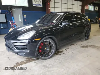 2012 Porsche Cayenne Turbo z VIN WP1AC2A24CLA81660, wystawiony jako Copart lot #58200545 z przebiegiem 161 651 mil mil oraz Czysty tytuł • Clean title. Historia ofert i sprzedaży dostępna na DreamBid. Obrazek 1.