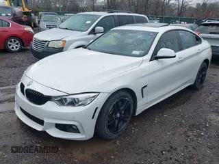 2016 BMW 4 Series 428i xDrive with VIN WBA4C9C57GG141554, listed as a IAAI auction lot 41988753 with Not Provided miles. Bid and sale history available at carsss.com. Image 2.