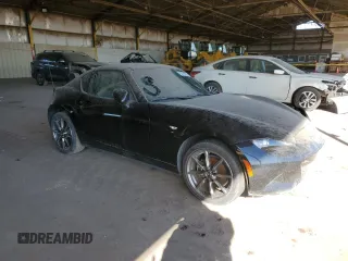 2023 Mazda MX-5 Miata Grand Touring z VIN JM1NDAM71P0551782, wystawiony jako Copart lot #88795725 z przebiegiem 22 626 mil mil oraz Nie do naprawy • Non repairable. Historia ofert i sprzedaży dostępna na DreamBid. Obrazek 4.