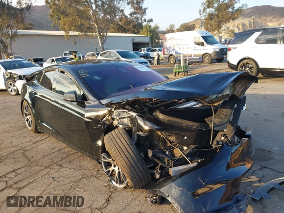 2022 Tesla Model S with VIN 5YJSA1E50NF462647, listed as a IAAI auction lot 41354668 with Not Provided miles and . Bid and sale history available at DreamBid. Image 1.