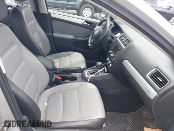 2014 Volkswagen Jetta Hybrid SE с VIN 3VW637AJ9EM284943, выставлен на аукционе IAAI как лот 42567020 с пробегом 164 928 миль миль и . История ставок и продаж доступна на DreamBid. Изображение 5.