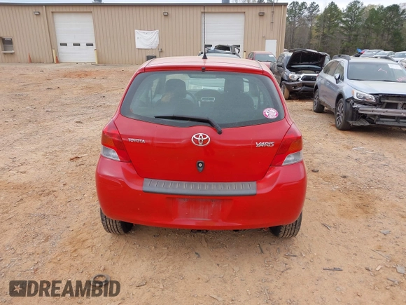 2009 Toyota Yaris with VIN JTDJT903595243068, listed as a IAAI auction lot 41899358 with 310,199 mi miles. Bid and sale history available at carsss.com. Image 16.