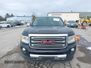 2015 GMC Canyon 4WD SLT with VIN 1GTG6CE39F1238269, listed as a IAAI auction lot 41327897 with 155,663 mi miles. Bid and sale history available at carsss.com. Image 12.