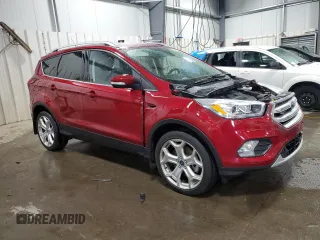 2019 Ford Escape Titanium with VIN 1FMCU9J9XKUA41715, listed as a Copart auction lot 57483725 with 30,644 mi miles and Salvage title. Bid and sale history available at DreamBid. Image 4.