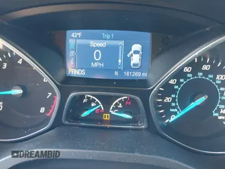 2014 Ford Escape SE z VIN 1FMCU0GX8EUC93873, wystawiony jako IAAI lot #42046040 z przebiegiem 161 269 mil mil oraz . Historia ofert i sprzedaży dostępna na DreamBid. Obrazek 7.