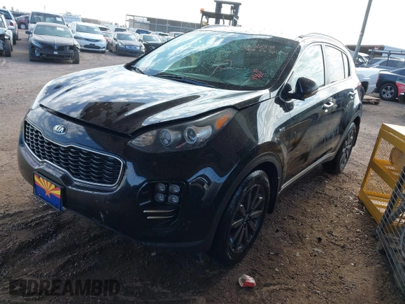 2018 Kia Sportage EX with VIN KNDPNCAC8J7460042, listed as a IAAI auction lot 41928598 with 234,870 mi miles and . Bid and sale history available at carsss.com. Image 2.
