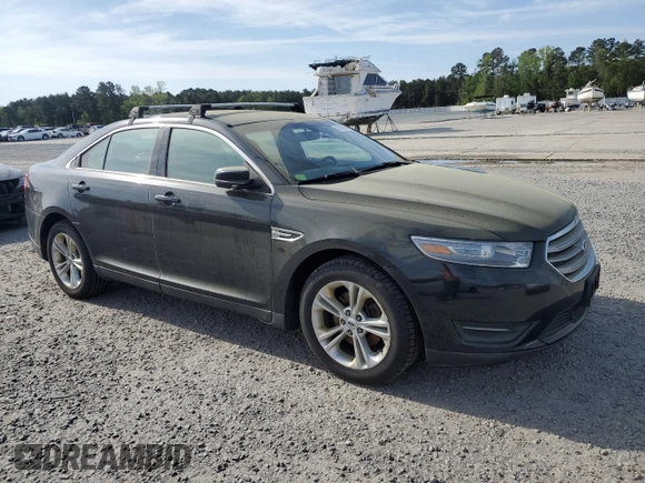 2014 Ford Taurus SEL with VIN 1FAHP2E87EG151866, listed as a Copart auction lot 52692965 with 201,680 mi miles and Clean Title. Bid and sale history available at DreamBid. Image 4.