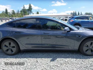 2023 Tesla Model 3 z VIN 5YJ3E1EA6PF650212, wystawiony jako IAAI lot #42554747 z przebiegiem 49 838 mil mil oraz . Historia ofert i sprzedaży dostępna na DreamBid. Obrazek 14.