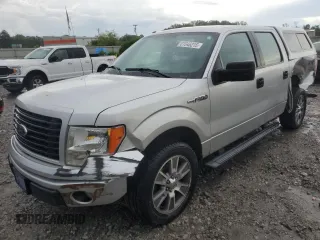 2014 Ford F-150 XL with VIN 1FTFW1CF3EKG56199, listed as a Copart auction lot 61046215 with 107,905 mi miles and Salvage title. Bid and sale history available at DreamBid. Image 1.