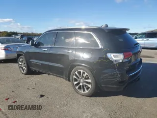 2017 Jeep Grand Cherokee Overland with VIN 1C4RJFCT9HC822898, listed as a Copart auction lot 86567034 with 120,699 mi miles and Salvage Title. Bid and sale history available at carsss.com. Image 2.