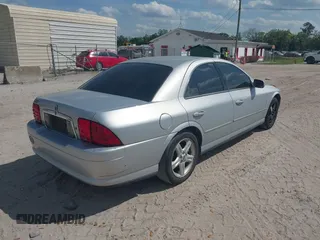 2000 Lincoln LS with VIN 1LNHM87A4YY886613, listed as a IAAI auction lot 41793515 with 144,061 mi miles. Bid and sale history available at carsss.com. Image 4.