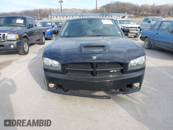 2006 Dodge Charger SRT-8 with VIN 2B3LA73W96H371246, listed as a IAAI auction lot 41676168 with 130,064 mi miles and . Bid and sale history available at carsss.com. Image 12.