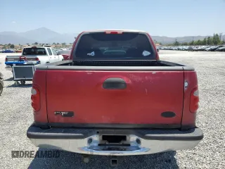2001 Ford F-150 XLT с VIN 1FTRW07L01KF03457, выставлен на аукционе Copart как лот 60086725 с пробегом 205 917 миль миль и Списание • Salvage title. История ставок и продаж доступна на DreamBid. Изображение 6.
