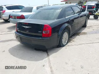 2009 Chrysler 300 LX with VIN 2C3KA43D19H536142, listed as a IAAI auction lot 42025538 with 1 mi miles. Bid and sale history available at carsss.com. Image 4.