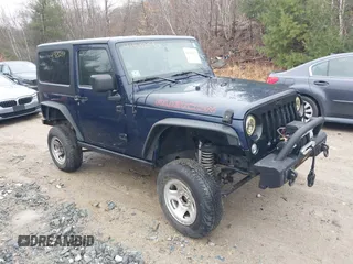 2013 Jeep Wrangler Rubicon 10th Anniversary with VIN 1C4BJWCG7DL544145, listed as a IAAI auction lot 41965259 with 125,900 mi miles and . Bid and sale history available at carsss.com. Image 1.