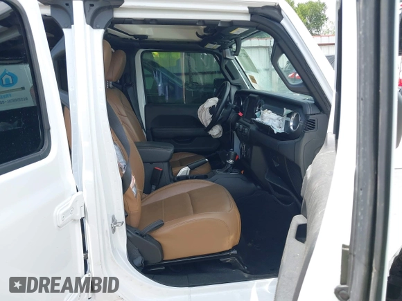 2021 Jeep Gladiator High Altitude with VIN 1C6HJTFG8ML551570, listed as a IAAI auction lot 42229235 with 56,959 mi miles and . Bid and sale history available at DreamBid. Image 5.