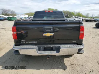 2014 Chevrolet Silverado 1500 LTZ with VIN 1GCVKSEC3EZ269921, listed as a Copart auction lot 51528565 with 137,218 mi miles and Salvage Title. Bid and sale history available at DreamBid. Image 6.