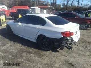 2015 BMW 5 Series 535i xDrive with VIN WBA5B3C53FD541695, listed as a IAAI auction lot 41485523 with 130,133 mi miles. Bid and sale history available at carsss.com. Image 3.