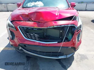 2021 Cadillac XT4 FWD Premium Luxury z VIN 1GYFZCR48MF004849, wystawiony jako IAAI lot #42131896 z przebiegiem 9 864 mil mil oraz . Historia ofert i sprzedaży dostępna na DreamBid. Obrazek 12.