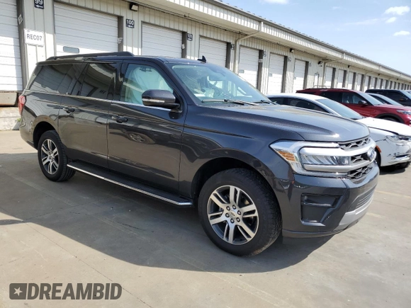 2023 Ford Expedition Max XLT with VIN 1FMJK1H87PEA09480, listed as a Copart auction lot 52716884 with 21,329 mi miles and Salvage title. Bid and sale history available at DreamBid. Image 4.