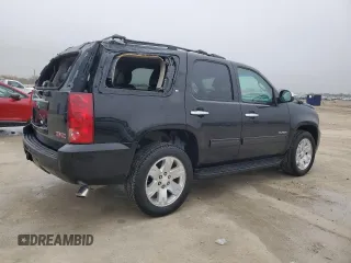 2012 GMC Yukon SLT with VIN 1GKS1CE04CR158460, listed as a Copart auction lot 84459174 with 153,662 mi miles and Salvage Title. Bid and sale history available at carsss.com. Image 3.