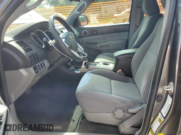 2015 Toyota Tacoma PreRunner with VIN 5TFJU4GN4FX067931, listed as a Copart auction lot 64411005 with 178,271 mi miles and Salvage title. Bid and sale history available at DreamBid. Image 7.