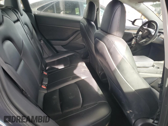 2023 Tesla Model 3 with VIN 5YJ3E1EA0PF449499, listed as a Copart auction lot 52900515 with 42,706 mi miles and Non Repairable. Bid and sale history available at DreamBid. Image 10.