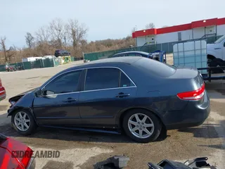 2003 Honda Accord EX z VIN 1HGCM66593A014065, wystawiony jako IAAI lot #41774694 z przebiegiem 163 536 mil mil oraz . Historia ofert i sprzedaży dostępna na DreamBid. Obrazek 15.