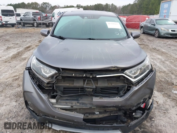 2019 Honda CR-V EX with VIN 7FARW1H57KE037678, listed as a IAAI auction lot 41790923 with 61,754 mi miles and . Bid and sale history available at DreamBid. Image 12.