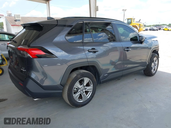 2023 Toyota RAV4 Hybrid LE with VIN JTMLWRFV6PD203044, listed as a IAAI auction lot 42320080 with 95,747 mi miles and . Bid and sale history available at DreamBid. Image 4.