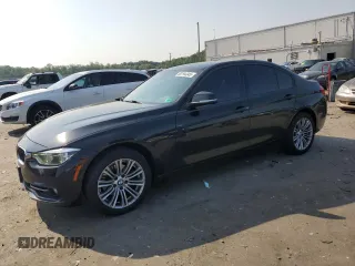 2018 BMW 3 Series 330i xDrive with VIN WBA8D9G56JNU69320, listed as a Copart auction lot 60794345 with 104,036 mi miles and Salvage title. Bid and sale history available at DreamBid. Image 1.