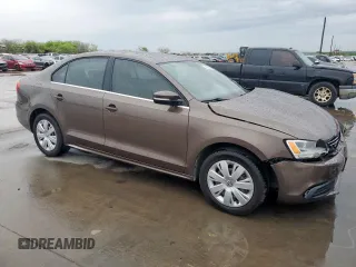 2013 Volkswagen Jetta SE with VIN 3VWDX7AJ9DM443065, listed as a Copart auction lot 51006995 with 93,981 mi miles and Salvage title. Bid and sale history available at DreamBid. Image 4.