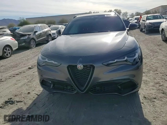 2024 Alfa Romeo Stelvio Veloce z VIN ZASPAKBN3R7D71181, wystawiony jako Copart lot #87510335 z przebiegiem 19 477 mil mil oraz Szkody całkowita. Historia ofert i sprzedaży dostępna na DreamBid. Obrazek 14.