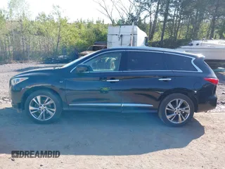 2015 Infiniti QX60 with VIN 5N1AL0MN3FC535859, listed as a IAAI auction lot 42010058 with 160,356 mi miles. Bid and sale history available at carsss.com. Image 14.