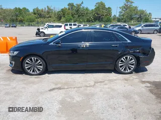 2018 Lincoln MKZ Reserve z VIN 3LN6L5E91JR602506, wystawiony jako IAAI lot #41976529 z przebiegiem 93 394 mil mil oraz . Historia ofert i sprzedaży dostępna na DreamBid. Obrazek 14.